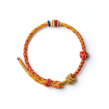 Protection and Luck – Handwoven Red String with Tibetan Dorje knot