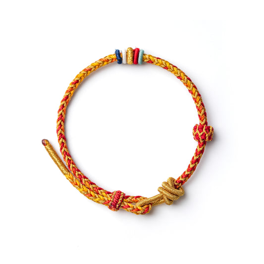 Protection and Luck – Handwoven Red String with Tibetan Dorje knot